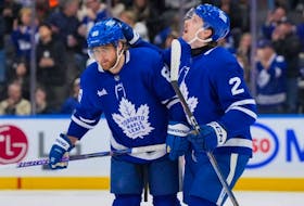 Maple Leafs forward William Nylander, left, celebrates his second period goal against the Rangers with Simon Benoit at Scotiabank Arena in Toronto, Saturday, March 2, 2024.