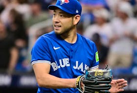 Blue Jays starting pitcher Yusei Kikuchi reacts following the first inning against the Rays at Tropicana Field in St Petersburg, Fla., Saturday, March 30, 2024.