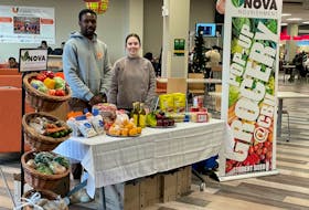 Chika Iwuji (left) and Alyssa Buchanan (right) are shown at a pop-up grocery event on Cape Breton University campus. Another pop up happens. Tuesday, March 5. - Contributed
