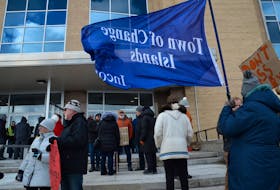 People gathered outside the Confederation Building on March 4, 2024, to protest a reduction in the Change Island ferry schedule.