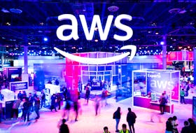 Attendees walk through an expo hall at AWS re:Invent 2023, a conference hosted by Amazon Web Services (AWS), in Las Vegas, Nevada, U.S., November 29, 2023. Noah Berger/AWS/Handout via