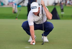 Mar 3, 2024; Palm Beach Gardens, Florida, USA; Austin Eckroat puts his ball on his marker on the fourth green during the final round of the Cognizant Classic in The Palm Beaches golf tournament. Mandatory Credit: Reinhold Matay-USA TODAY Sports