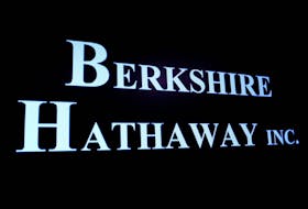 Berkshire Hathaway logo is displayed on a screen on the floor of the New York Stock Exchange (NYSE) in New York City, U.S., May 10, 2023. 