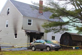 The back of the home at 222 Park St., Sydney where a fire Saturday evening which resulted in the death of one person who was on the top floor when the fire broken out. NICOLE SULLIVAN/CAPE BRETON POST