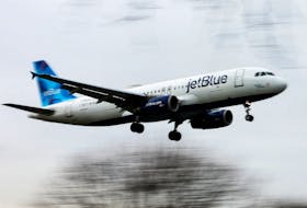 A JetBlue Airways jet comes in for a landing after flights earlier were grounded during an FAA system outage at Laguardia Airport in New York City, New York, U.S., January 11, 2023.