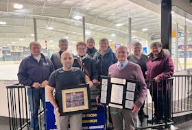 A reception took place at Credit Union Centre in Kensington recently to honour the accomplishments of the Community Gardens Ladies, Kensington Spudettes, Prince County Spudettes and P.E.I. Spudettes. Dwayne McNeill, front left, owner of Source for Sports in Summerside, holds a team photo and Kensington Mayor Rowan Caseley displays a plaque donated by McNeill. The plaque and team photo are displayed in the Kensington arena’s canteen. In the back row are players with the 1976 P.E.I. Spudettes, who won the Canadian B ladies hockey championship in Brampton, Ont. From left: Amy Ramsay, Marlene Adams, Kay McQuaid, Lorraine MacDonald, June (Carpenter) Ramsay, Joanne (McNeill) Perry and Tina (Gallant) Murphy. Robert Wood Photo • Special to SaltWire