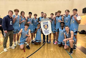 The C.P. Allen Cheetahs celebrate their third straight SSNS Division 1 provincial boys' basketball title on Sunday. - Contributed
