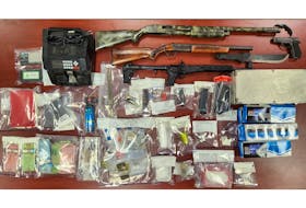 Among the items seized by the P.E.I. RCMP in Harrington on Friday, March 1, were three firearms, edged weapons, cash and 60 grams of suspected cocaine. Charges are pending against two men arrested at the scene.
