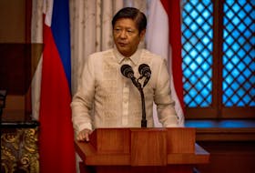Philippine President Ferdinand Marcos Jr. delivers a joint statement during the visit of Indonesian President Joko Widodo at the Malacanang Palace, in Manila, Philippines, January 10, 2024.     Ezra Acayan/Pool via