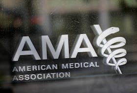 The American Medical Association logo is seen at their office in Washington, D.C., U.S., August 30, 2020.