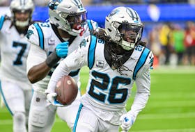 Oct 16, 2022; Inglewood, California, USA; Carolina Panthers cornerback Donte Jackson (26) returns an interception for 30 yards and a touchdown in the second quarter against the Los Angeles Rams at SoFi Stadium. Mandatory Credit: Robert Hanashiro-USA TODAY Sports/File Photo