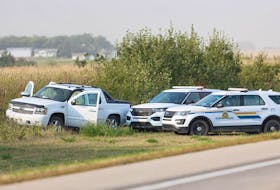 This file photo shows RCMP on scene on Highway 11 after the arrest of Myles Sanderson on Sept. 7, 2022. Sanderson killed 11 people in a stabbing rampage on and near James Smith Cree Nation. A University of Regina psychology professor considers mass casualty events to be among stressors that most likely explain a rise in reported mental health disorders among RCMP members.