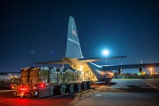 Over 38,000 Meals Ready to Eat and water destined for an airdrop over Gaza are loaded aboard a U.S. Air Force C-130J Super Hercules at an undisclosed location in Southwest Asia, March 1, 2024.  U.S. Air Force/Handout via REUTERS