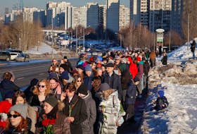 People queue to the Borisovskoye cemetery as they come to the grave of Russian opposition politician Alexei Navalny, in Moscow, Russia, March 3, 2024.