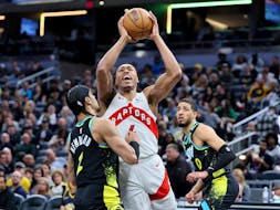 Scottie Barnes of the Toronto Raptors shoots the ball against the Indiana Pacers.
