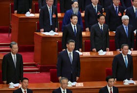 Chinese President Xi Jinping and other leaders sing the national anthem at the opening session of the Chinese People's Political Consultative Conference (CPPCC) at the Great Hall of the People in Beijing, China March 4, 2024.