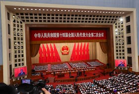 Chinese Premier Li Qiang delivers the work report at the opening session of the National People's Congress (NPC) at the Great Hall of the People in Beijing, China March 5, 2024.