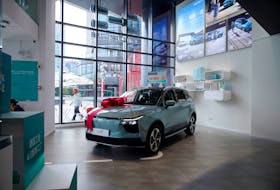 An Aiways U5 electric car is displayed at a company store in Shanghai, China September 22, 2020. Picture taken September 22, 2020.