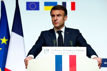 French President Emmanuel Macron speaks during a press conference at the end of the conference in support of Ukraine, with European leaders and government representatives, at the Elysee Palace in Paris, France, February 26, 2024.