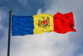 The Moldovan flag files during a ceremony marking the State Flag Day in Chisinau, Moldova April 27, 2023.