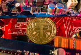 A representation of cryptocurrency Tether is placed on a PC motherboard, in this illustration taken June 16, 2023.