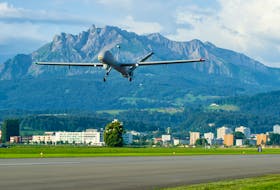 Mount Pilatus is seen in the background a drone of the reconnaissance drone system 15 (ADS 15) of the Swiss Armed Forces takes-off for a first flight at an airbase in Emmen, Switzerland June 15, 2022. VBS/DDPS/Handout via