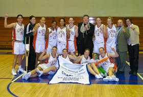 The University College of Cape Breton Capers women’s basketball team won its first Atlantic University Sport championship on March 7, 2004, beating the Memorial Sea-Hawks 67-61 in the championship game at Oland Centre in Antigonish. Members of the team, front row, from left, Sharalee Dempster, Lindsey Smith, Heather Ross, Candance Reynolds and Kelli McHugh. Back row, from left, Cecilia Romero-Martinez, Ashley Downie, Sandra Romas, Miranda Munro, Tamara Alleyne, Maureen Murrin, Fabian McKenzie (coach), Kim Reynolds, Shannon Labre, Doug Connors (assistant coach) and Jeff Lalanne (assistant coach). Missing from the photo was Mandy Morgan (manager). GREG MCNEIL/CAPE BRETON POST