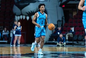 Nova Scotia's Kellen Tynes dribbles the ball down the floor for the Maine Black Bears during an NCAA Division 1 basketball game. - University of Maine Athletics