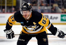 Pittsburgh Penguins centre Sidney Crosby at the face-off circle against the Columbus Blue Jackets during Tuesday's NHL at PPG Paints Arena in Pittsburgh. - Charles LeClaire-USA TODAY Sports