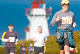 With the lighthouse at the entrance to Covehead Harbour behind her, Nadine Smillie of Halifax heads toward Dalvay during the 2007 edition of the Prince Edward Island Marathon. While this event is celebrating its 20th anniversary in 2024, P.E.I.'s first marathon, which was organized by the P.E.I. Roadrunners, took place in September 1979. Guardian file