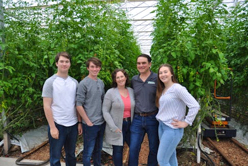 Marc Schurman, second right, and Krista Schurman, third left, owners of Atlantic Grown Organics, are joined by Quinton Schurman, left, Benjamin Schurman and Samantha Schurman. The family business grows vegetables on P.E.I. Marc said finding local workers to work on the farm has been challenging, and most of the farm's workforce is made up of temporary foreign workers. Contributed