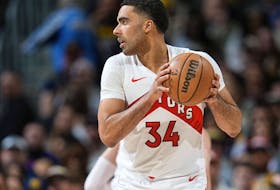 Toronto Raptors' Jontay Porter holds the ball during a game earlier this year.