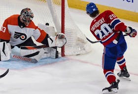 Canadiens' Juraj Slafkovsky the second of his three goals against Flyers goalie Samuel Ersson Tuesday night at the Bell Centre.