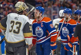 Connor McDavid (97) of the Edmonton Oilers, shakes hands with Adin Hill (33) of the Las Vegas Golden Knights after Game 6 of the second round of the NHL playoffs at Rogers Place in Edmonton on May 14, 2023. The Golden Knights advanced after winning the series 4-2.