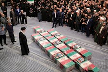 Iran's Supreme Leader, Ayatollah Ali Khamenei looks at the coffins of members of the Islamic Revolutionary Guard Corps who were killed in the Israeli airstrike on the Iranian embassy complex in the Syrian capital Damascus, during a funeral ceremony in Tehran, Iran April 4, 2024. Office of the Iranian Supreme Leader/WANA (West Asia News Agency)/Handout via