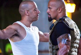  Vin Diesel and Dwayne Johnson in a scene from 2011’s Fast Five.