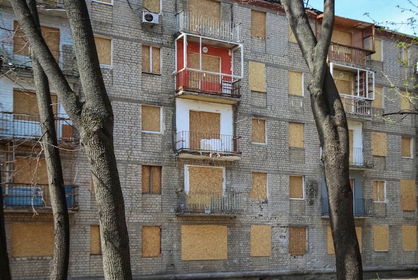 A view shows covered windows of the residential building, which was damaged by a Russian military strike in March 27, amid Russia's attack on Ukraine, in Kharkiv, Ukraine, April 8, 2024.
