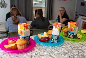 Snacks are set up at Family SOS in Spryfield as some of the kids play cards on Thursday, April 12, 2024.
Ryan Taplin - The Chronicle Herald
