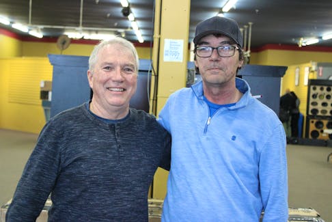 Soundafex owner Stephen Bidart, left, and general manager Lloyd Cox at the Sydney electronics store on Friday — its final day in business after 45 years. Soundafex will continue with installation services but the storefront will close as Bidart gradually begins to step away from the business. LUKE DYMENT/CAPE BRETON POST
