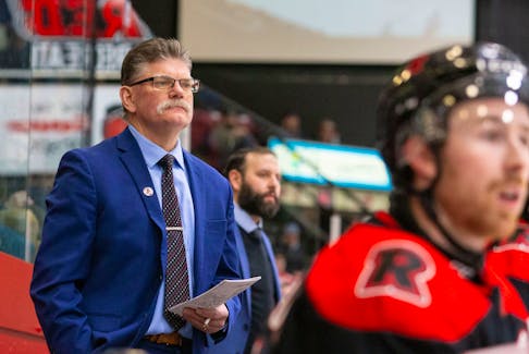 UNB Reds head coach Gardiner MacDougall follows the play during an Atlantic University Sport (AUS) Men’s Hockey Conference game during the 2023-24 season. MacDougall, from Bedeque, P.E.I., has been named head coach of Team Canada for the International Ice Hockey Federation (IIHF) world under-18 championship in Finland from April 25 to May 5. James West Photo/For UNB Athletics