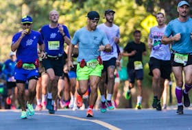 People run near during the Montreal Marathon on Sept. 24, 2023. 
“Most training programs are too aggressive,” says Reed Ferber, professor in the Department of Kinesiology at University of Calgary and director of the Running Injury Clinic, who recommends taking 20 or more weeks to get marathon ready. 