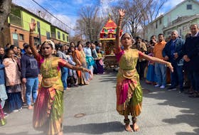 Traditional Hindu dancers Akshitaa and Ananya began Subramanya's chariot procession down Cork Street in Halifax on Sunday.