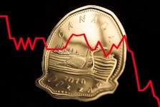 The Canadian dollar could sink as low as 70 US cents this year if the Bank of Canada cuts interest rates more than the Fed, say economists. 