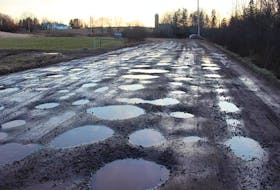 Gravel roads can be easily deteriorated by weather, on top of regular wear-and-tear. While paving may seem like a solution to some, it has it's draw backs for farmers. GARY SAUNDERS