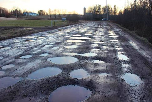 Gravel roads can be easily deteriorated by weather, on top of regular wear-and-tear. While paving may seem like a solution to some, it has it's draw backs for farmers. GARY SAUNDERS