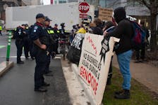 Pro-Palestinian protesters rally at the intersection of Hollis Street and Terminal Road on Monday, April 15, 2024.
Ryan Taplin - The Chronicle Herald