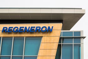 The Regeneron Pharmaceuticals company logo is seen on a building at the company's Westchester campus in Tarrytown, New York, U.S. September 17, 2020.