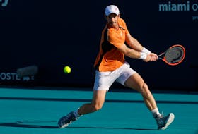 Mar 24, 2024; Miami Gardens, FL, USA; Andy Murray (GBR) hits a backhand against Tomas Machac (CZE) (not pictured) on day seven of the Miami Open at Hard Rock Stadium. Mandatory Credit: Geoff Burke-USA TODAY Sports