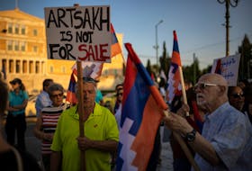 Members of the Armenian community protest over the evolving situation in Nagorno-Karabakh, where tens of thousands of ethnic Armenians have fled their homes, in Athens, Greece, October 1, 2023.