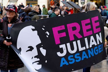 Supporters of WikiLeaks founder Julian Assange protest on the day he appeals in a British court against his extradition to the United States, in Vienna, Austria February 20, 2024.
